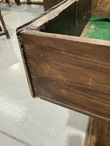 Lot 107 - A George III oak pot board dresser base with a...