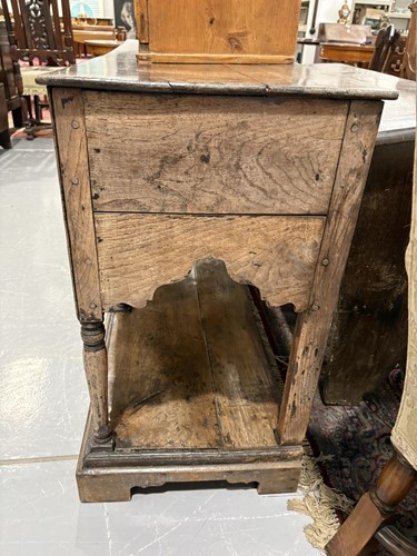 Lot 107 - A George III oak pot board dresser base with a...