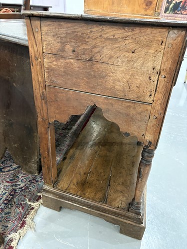 Lot 107 - A George III oak pot board dresser base with a...