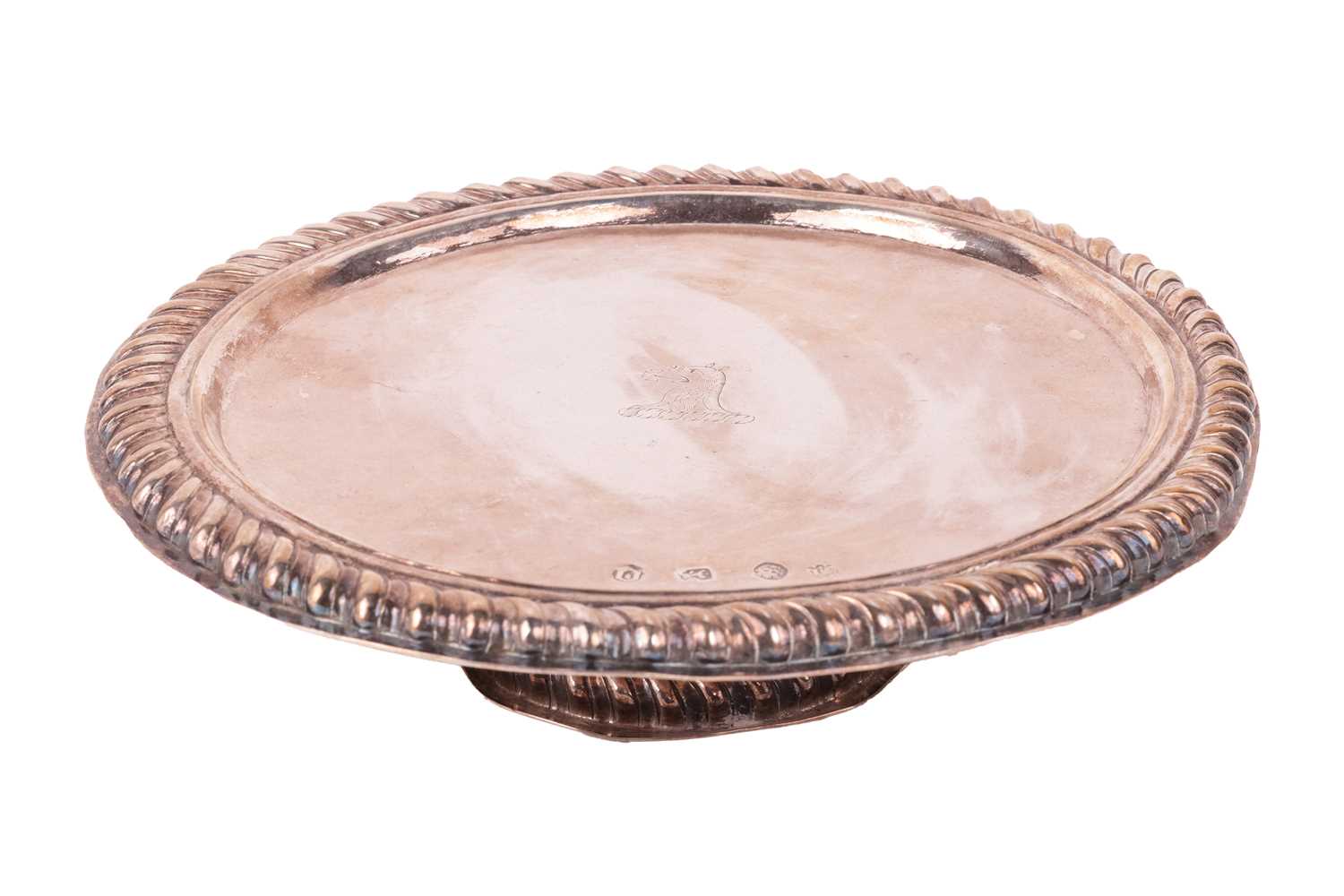 Lot 341 - A William & Mary circular silver paten, London...