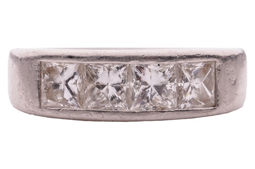 Lot 15 - A diamond half-hoop ring in platinum,...