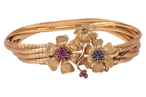 Lot 230 - A gem-set floral upper arm bracelet,...