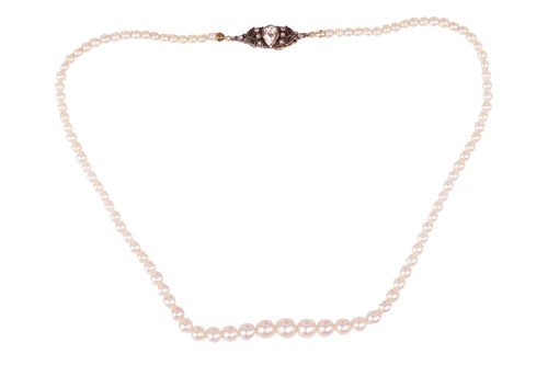 Lot 164 - A cultured pearl necklace, the graduated...