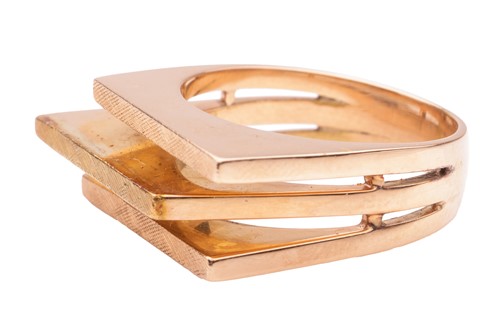 Lot 184 - An abstract dress ring of angular form, flat...