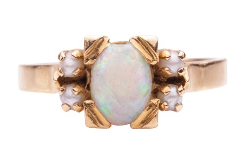 Lot 131 - An opal and seed pearl dress ring, featuring...