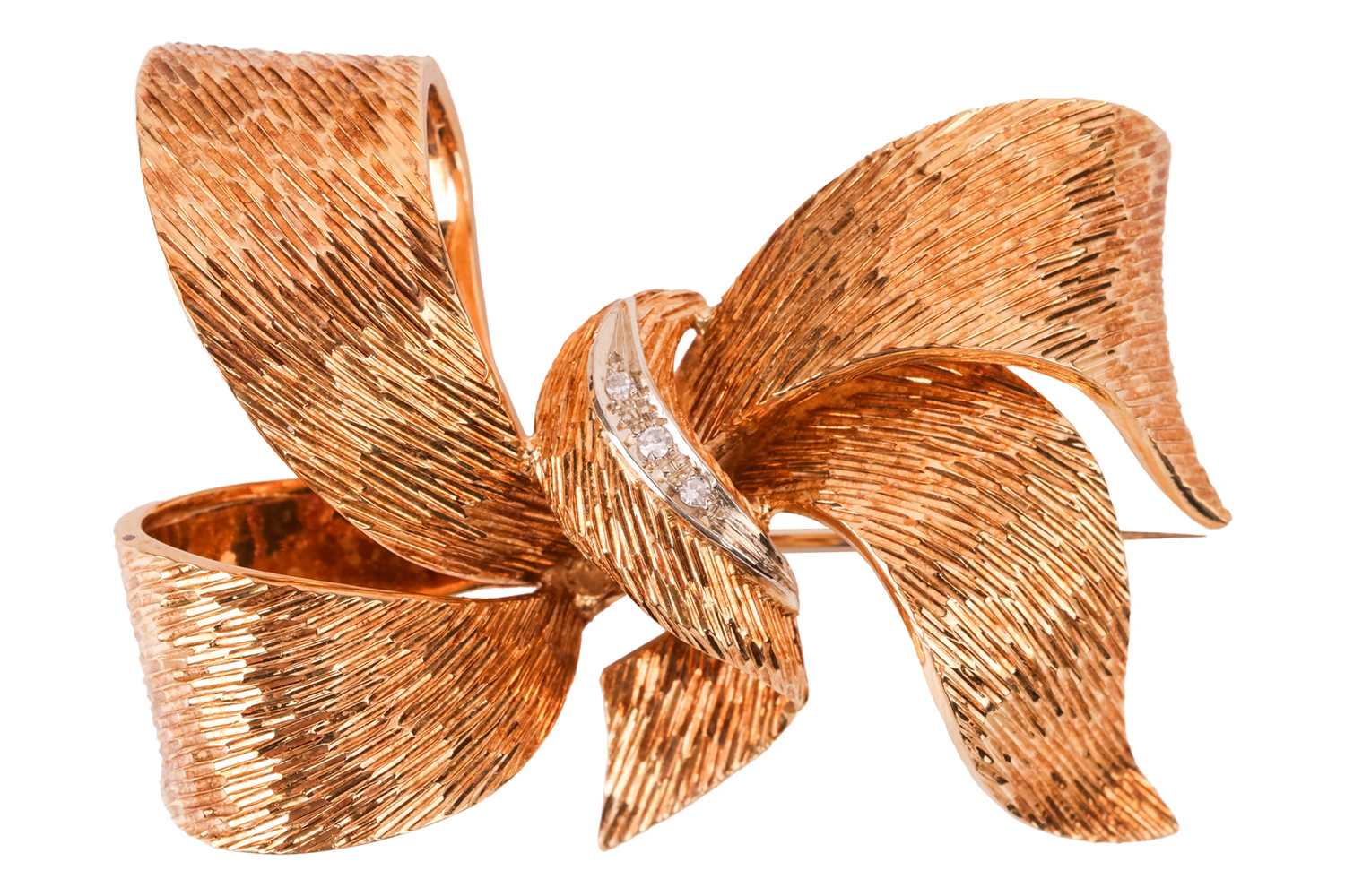 Lot 183 - A diamond-set bow brooch in 18ct gold, with...