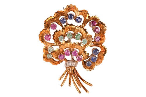 Lot 181 - A gem-set brooch in the form of a stylised...