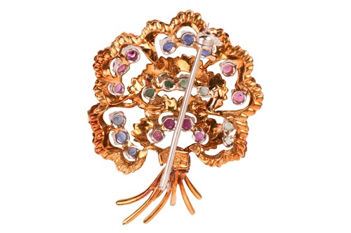 Lot 181 - A gem-set brooch in the form of a stylised...
