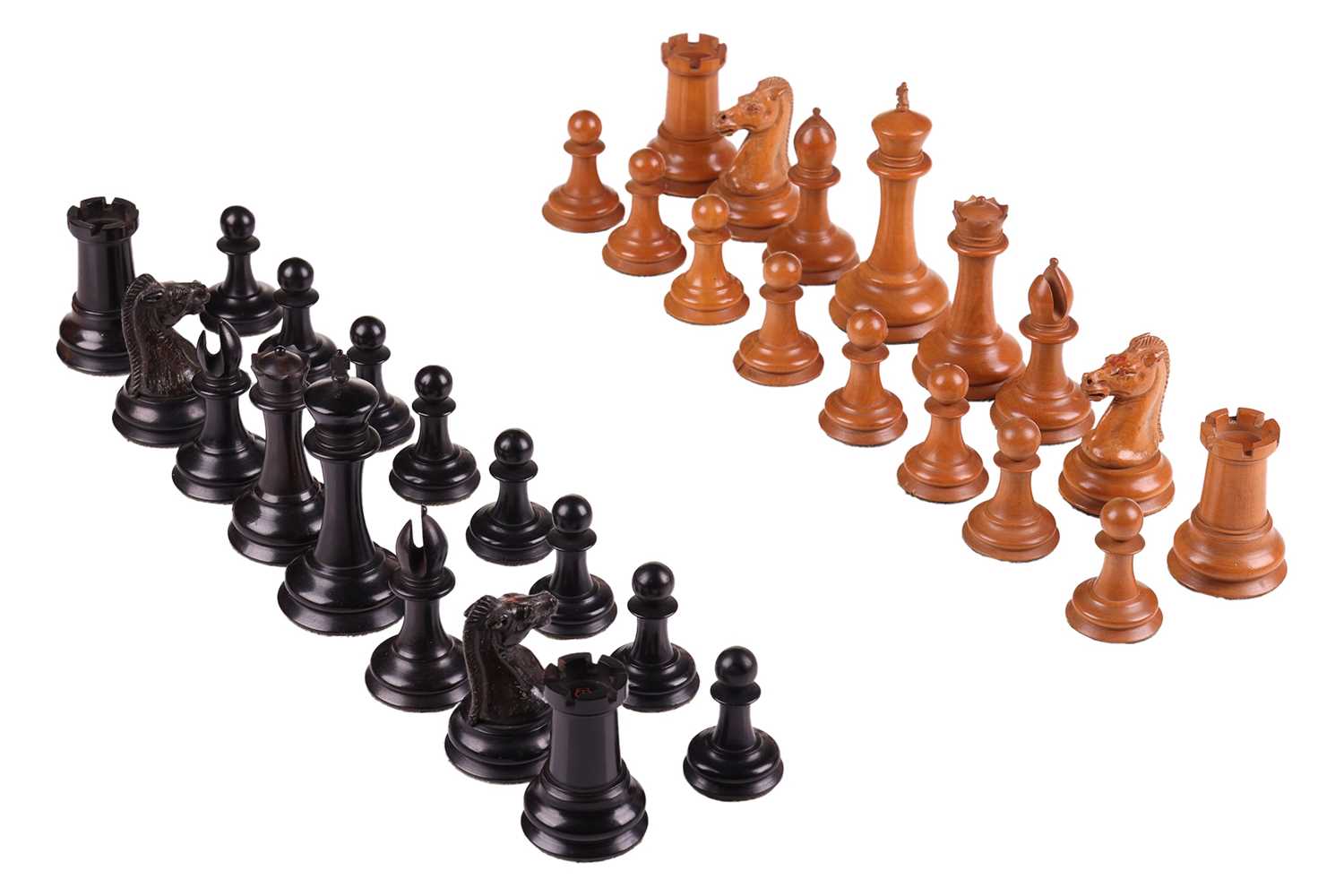 Lot 215 - A Staunton pattern boxwood and ebony chess set,...