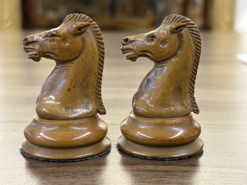 Lot 215 - A Staunton pattern boxwood and ebony chess set,...