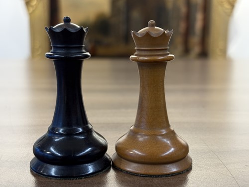 Lot 215 - A Staunton pattern boxwood and ebony chess set,...