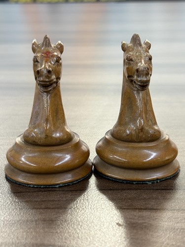 Lot 215 - A Staunton pattern boxwood and ebony chess set,...