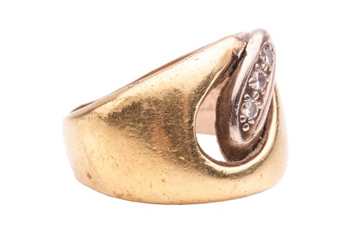 Lot 135 - A two-tone interlocking ring, highlighted with...