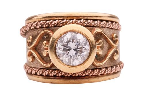 Lot 270 - A diamond-set dress ring, the round brilliant...