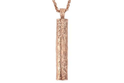 Lot 132 - A 9ct gold log pendant on chain, the pendant...