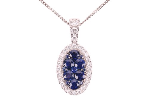 Lot 140 - A sapphire and diamond-set cluster pendant,...