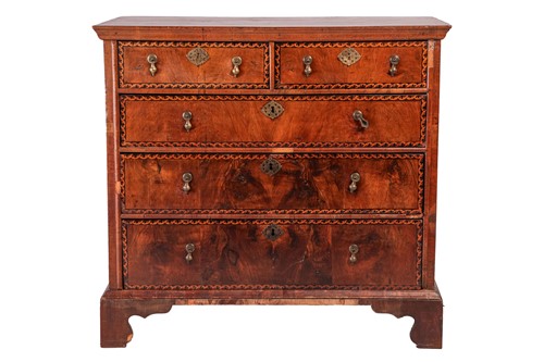 Lot 115 - An early 18th-century walnut chest of two...