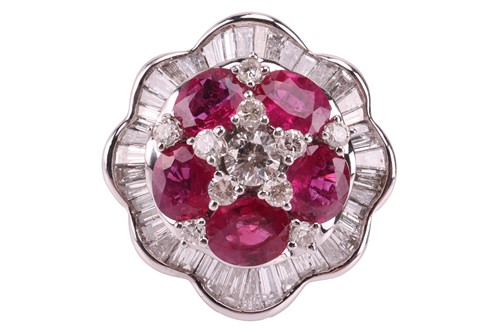 Lot 158 - A ruby and diamond ballerina ring the central...