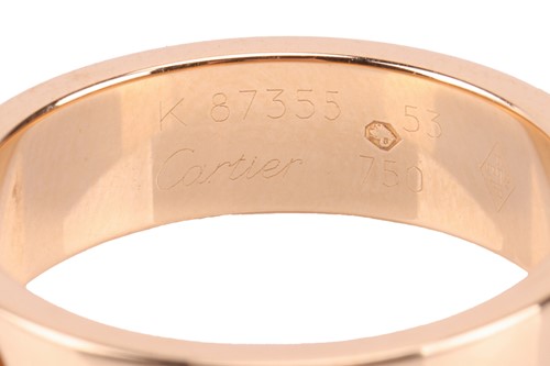 Lot 202 - Cartier - a 'Love' ring, flat polished band...
