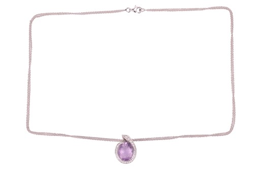 Lot 189 - Boodles - a Sonata pendant on chain set with...