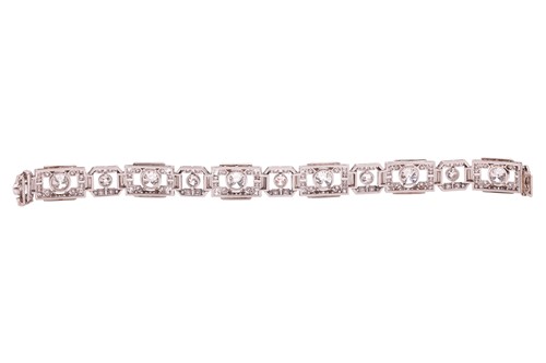 Lot 267 - An Art Deco diamond link bracelet, angular...