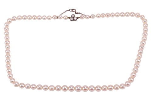 Lot A cultured pearl necklace with a diamond-set...