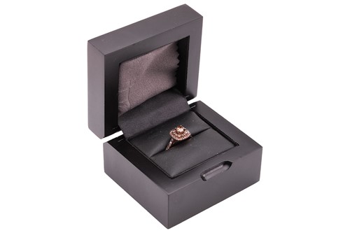 Lot 237 - A brown diamond cluster ring in 9ct rose gold,...