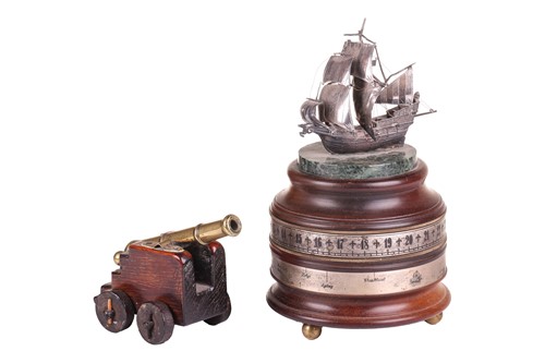 Lot A 19th-century miniature naval cannon with a...