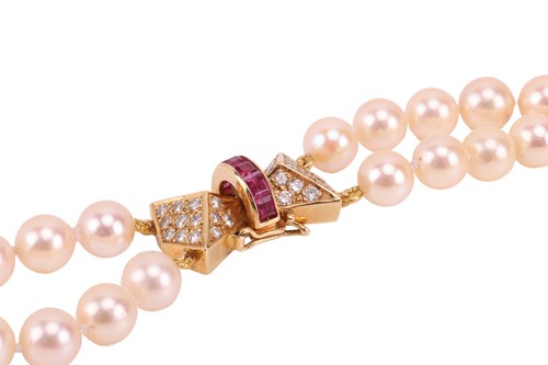 Lot 179 - A double-row cultured pearl necklace with a...