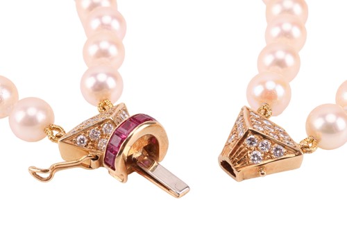 Lot 179 - A double-row cultured pearl necklace with a...