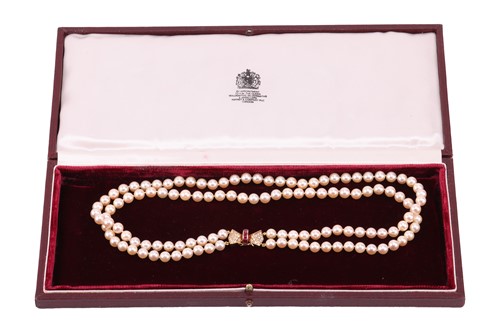 Lot 179 - A double-row cultured pearl necklace with a...