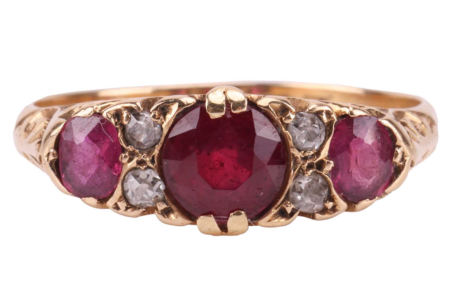 Lot 207 - An Edwardian ruby and diamond half-hoop ring...