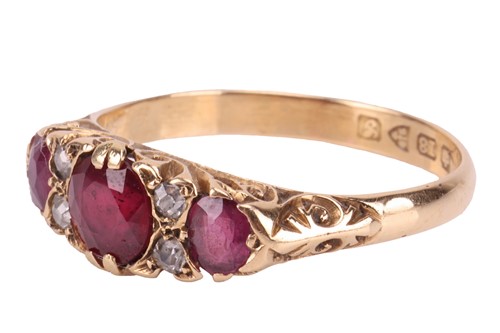 Lot 207 - An Edwardian ruby and diamond half-hoop ring...