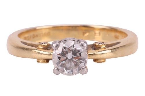 Lot 13 - A diamond solitaire ring, featuring a round...