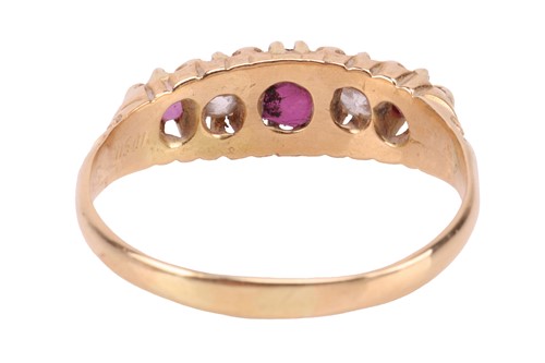 Lot 155 - An Edwardian ruby and diamond-set half-hoop...