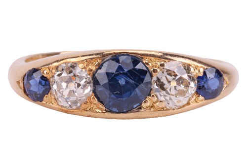 Lot 229 - A sapphire and diamond half-hoop ring,...