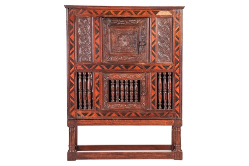 Lot A part 17th century oak Dole cupboard, with a...