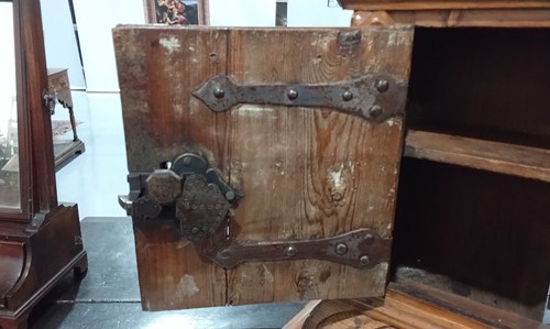 Lot 94 - A 16th/17th pine single-door wall cupboard,...