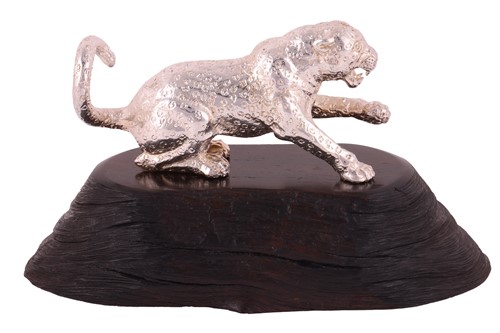 Lot 361 - A Patrick Mavros figure of a leopard on an...