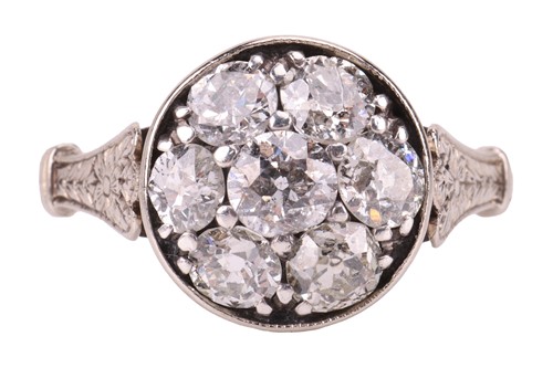 Lot 47 - A diamond cluster dress ring, the circular...