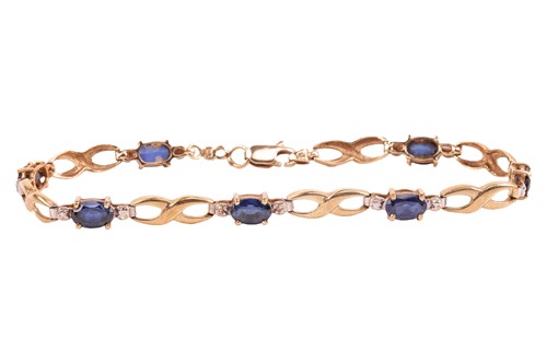 Lot A sapphire bracelet, six oval sapphires...