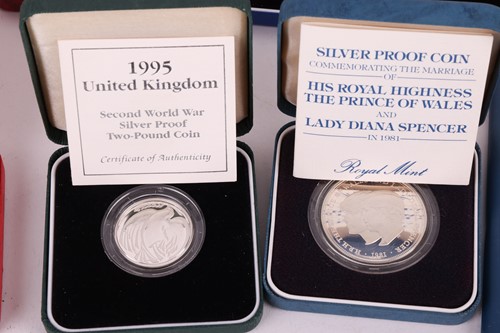 Lot 145 - A collection of twelve cased silver proof...