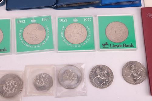 Lot 145 - A collection of twelve cased silver proof...
