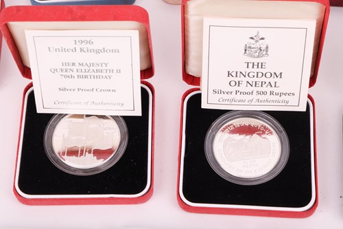 Lot 145 - A collection of twelve cased silver proof...