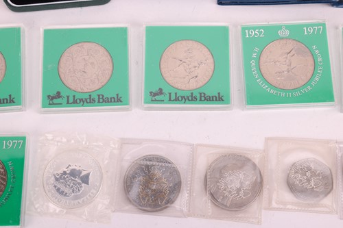 Lot 145 - A collection of twelve cased silver proof...
