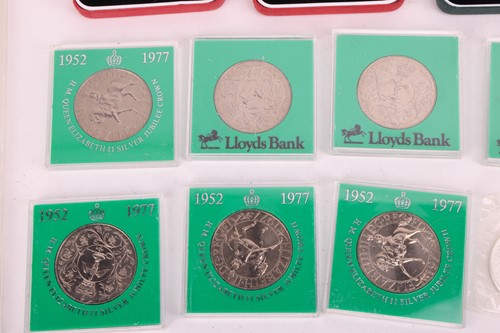 Lot 145 - A collection of twelve cased silver proof...
