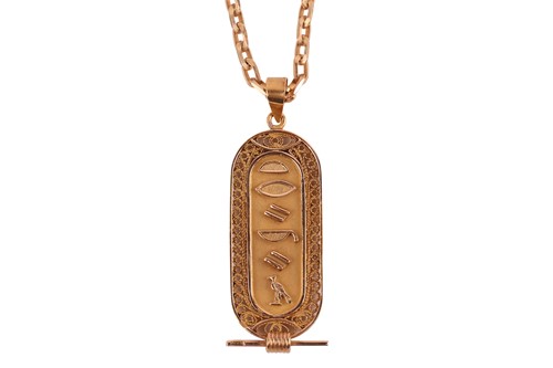 Lot 104 - An Egyptian cartouche pendant on a cable link...