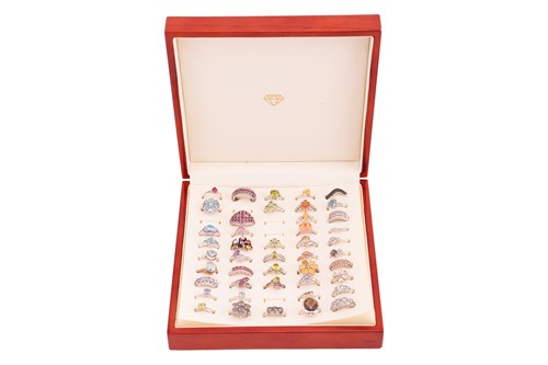 Lot 19 - A large collection of gem-set rings, including...