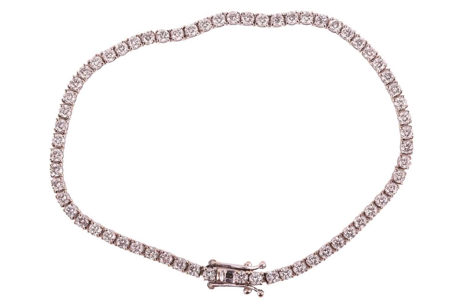 Lot 71 - A diamond-set line bracelet, with