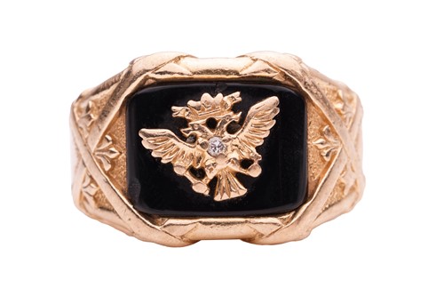 Lot A gem-set signet ring, the square head inlaid...